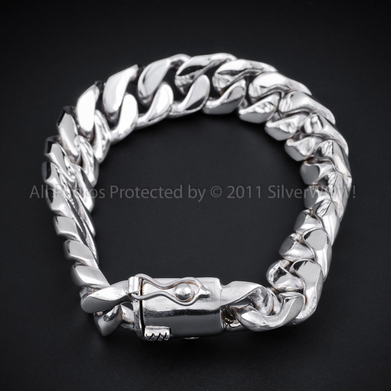 20mm Cuban Link Bracelet in silver closed on black background