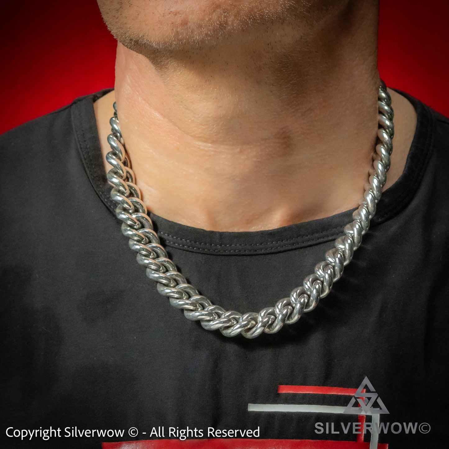 Heavy curb chain necklace in sterling silver worn by model – chunky rounded links