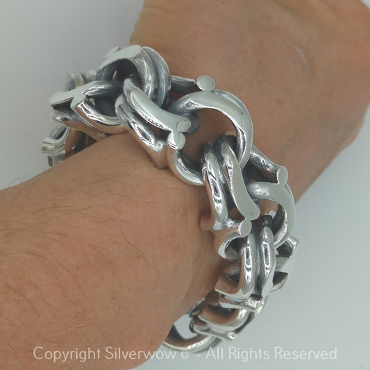 Heavy Garibaldi Bismarck bracelet on wrist, top view