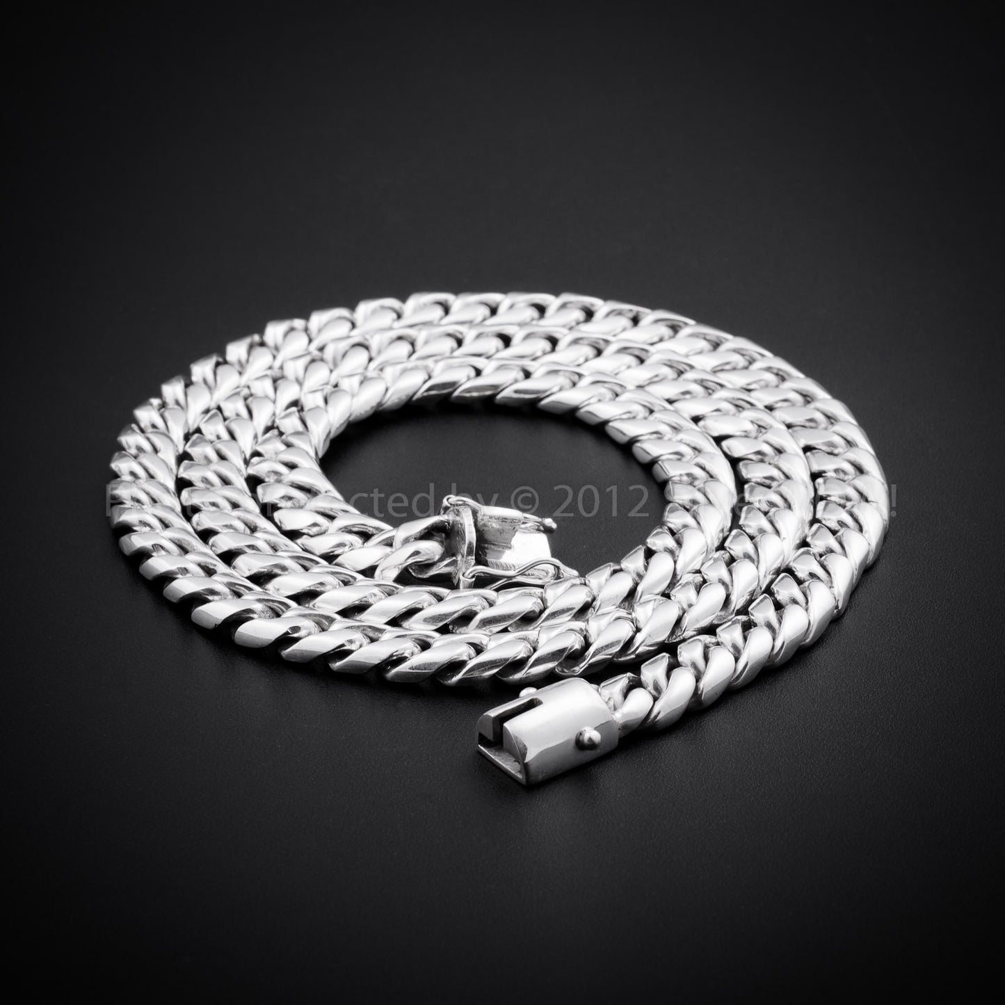 15mm Cuban link necklace in coiled layout showing chain structure