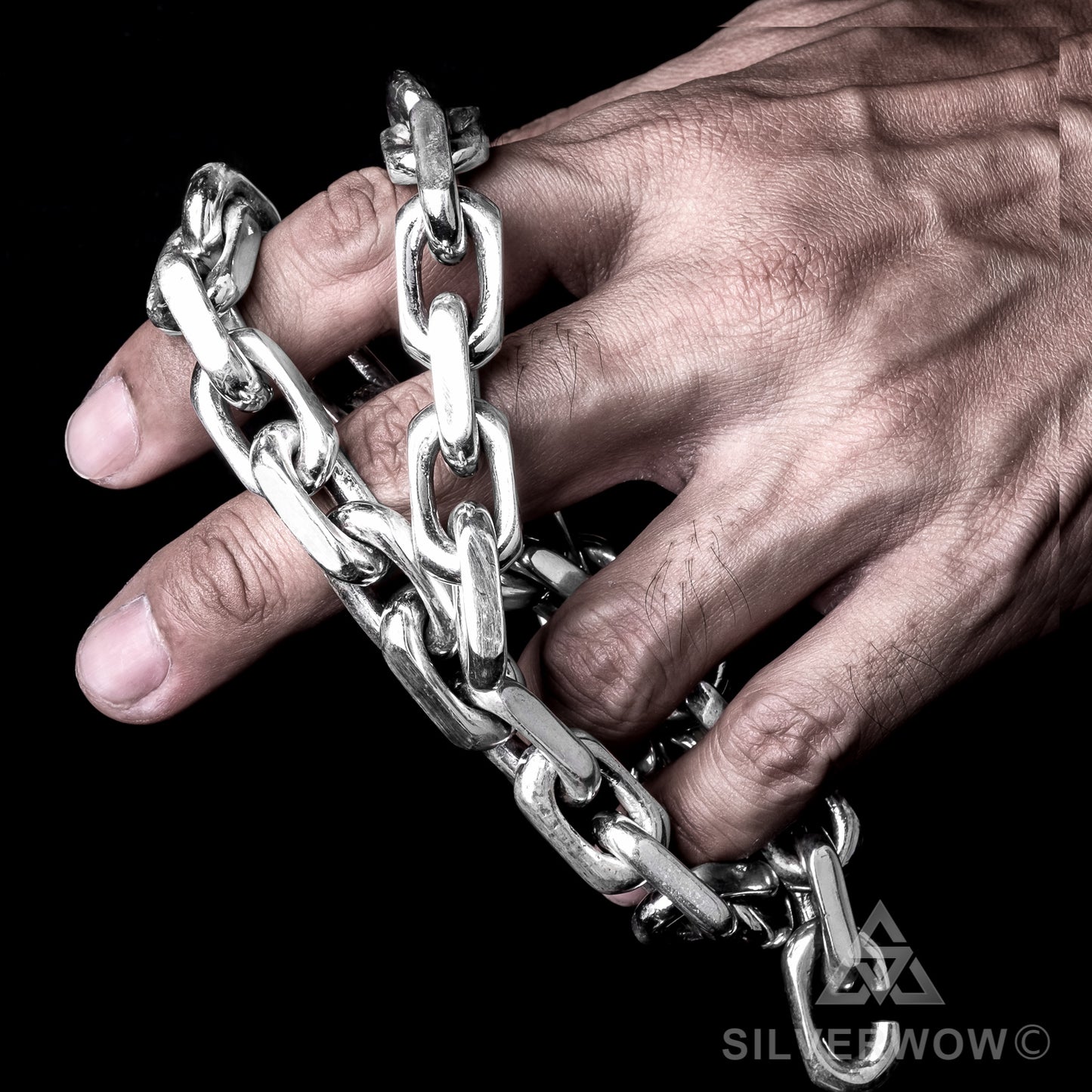 15mm heavy chain necklace in both hands — thick polished silver links