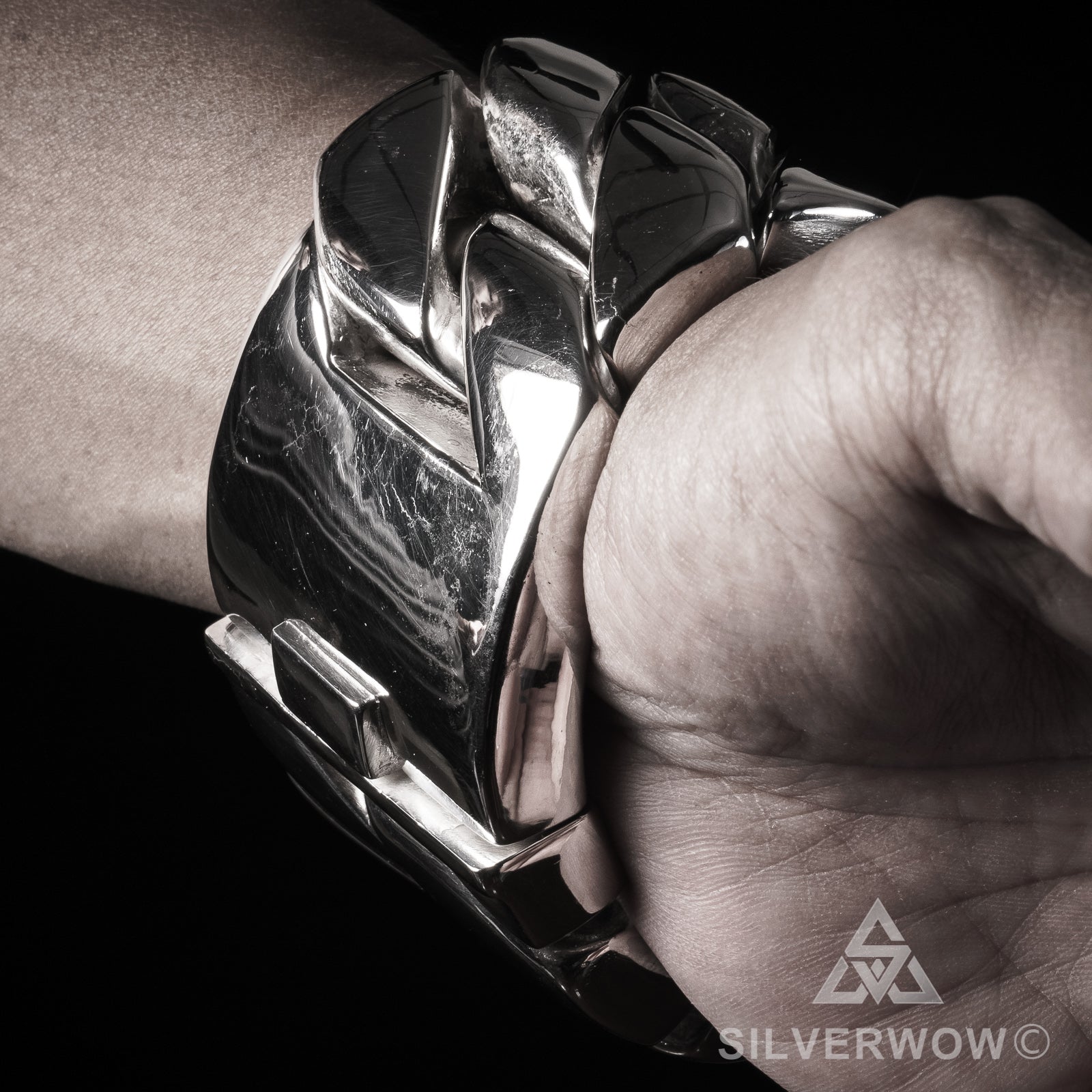 massive cuban link bracelet close-up on wrist – 45mm wide solid silver