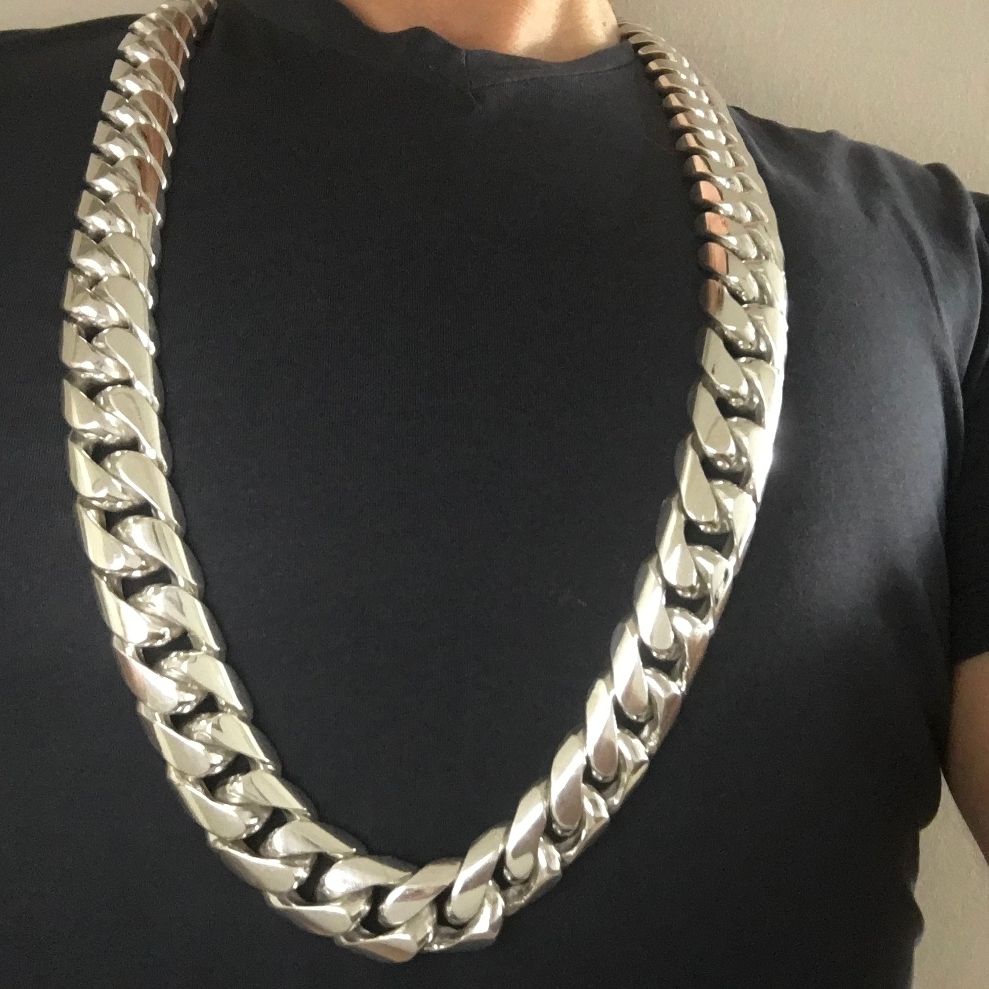 25mm men's silver Cuban link necklace styled with t-shirt
