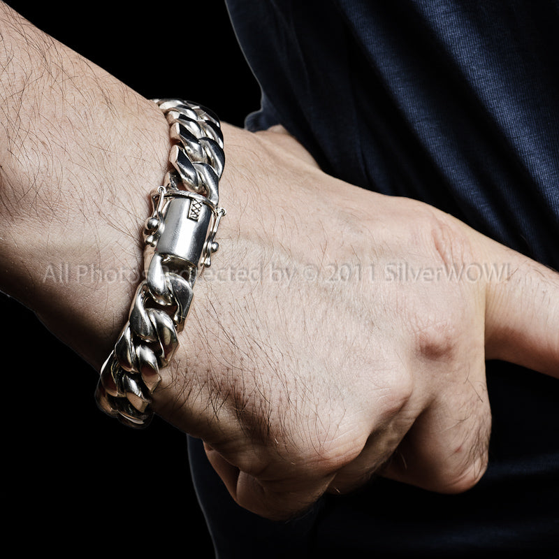 Men’s silver Cuban link bracelet, medium weight, worn on wrist