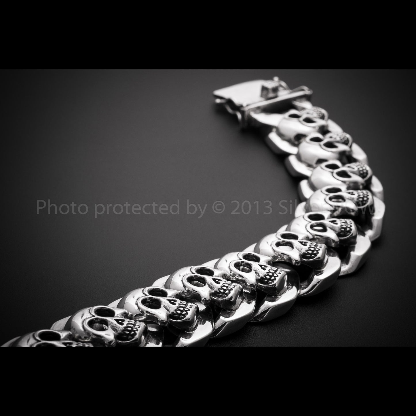 Angled view of large silver skull bracelet – SilverWow heavy design