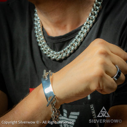 Sterling silver toggle clasp ID bracelet styled with  silver Cuban chain necklace.