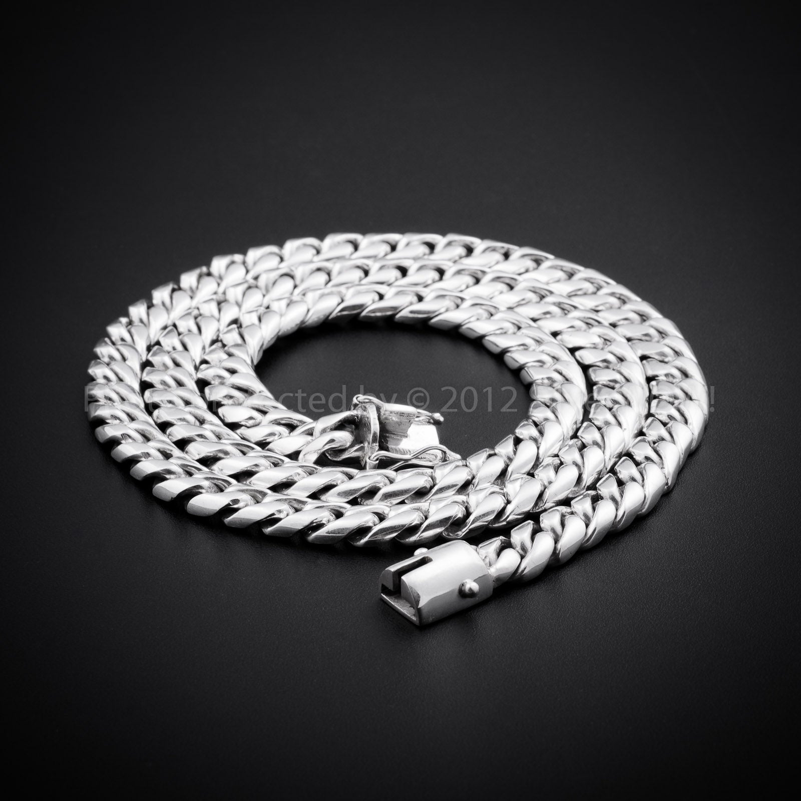 15mm Cuban link necklace in coiled layout showing chain structure