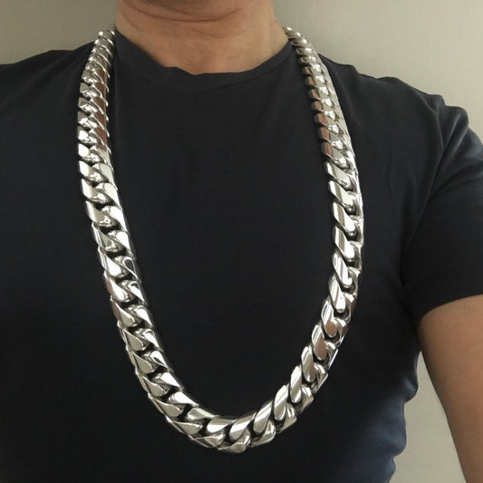 Close-up of handcrafted 25mm wide silver Cuban chain